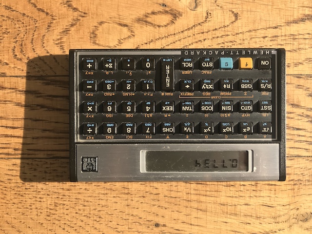 photograph a well-worn Hewlett-Packard HP-11c calculator